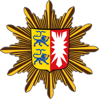 Polizeistern mit Wappen von Schleswig-Holstein